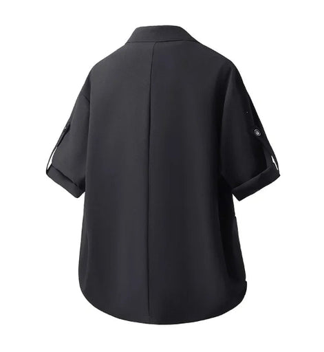 A black short-sleeve button-up shirt shown from the back, featuring a central seam and rolled cuffs with button details, set against a plain white background.