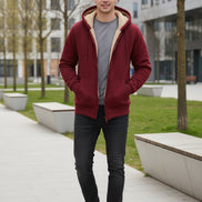 Red hoodie with beige lining on a white background