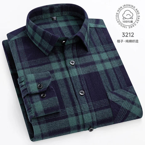 Folded green and navy plaid shirt on a white background with brand logo.