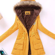 Yellow winter coat with fur-lined hood on a white background