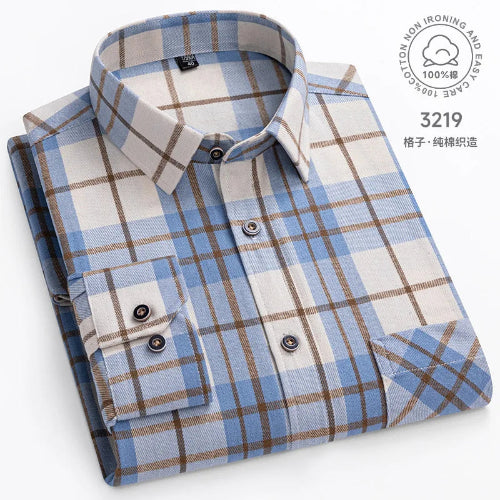 Folded blue and white checkered shirt on a white background