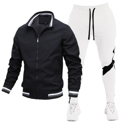 Black jacket and white pants with black accents on a white background