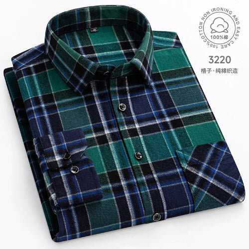 Folded green and navy plaid shirt on a white background with brand logo.