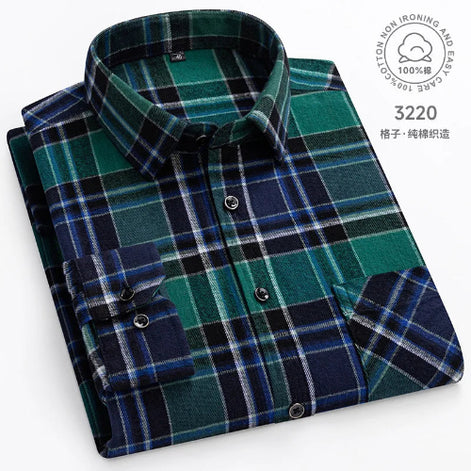 Folded green and navy plaid shirt on a white background with brand logo.