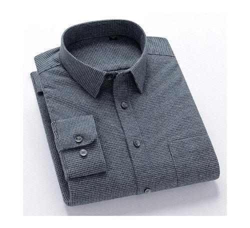 A folded long-sleeve button-up dress shirt with a fine micro-check pattern in dark gray and black, featuring a classic collar and a buttoned chest pocket.