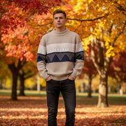 Beige and blue striped sweater on a white background