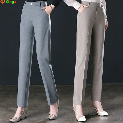 Two pairs of gray pants worn by models on a dark background