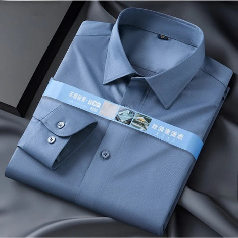 Folded blue dress shirt with a brand label on a dark background