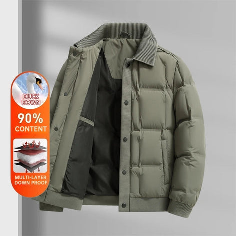 An olive green men's puffer jacket with a ribbed corduroy collar and front buttons, shown open against a gray background with a promotional orange badge on the left.