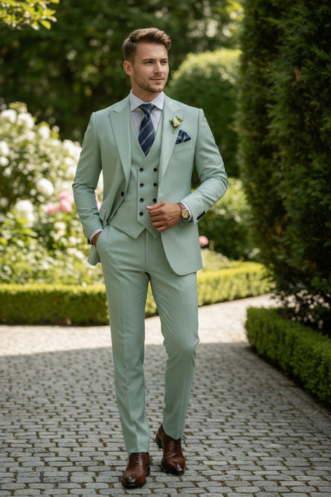 Light green suit with a tie and pocket square on a white background