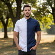 Two-tone white and navy shirt with buttons on a white background