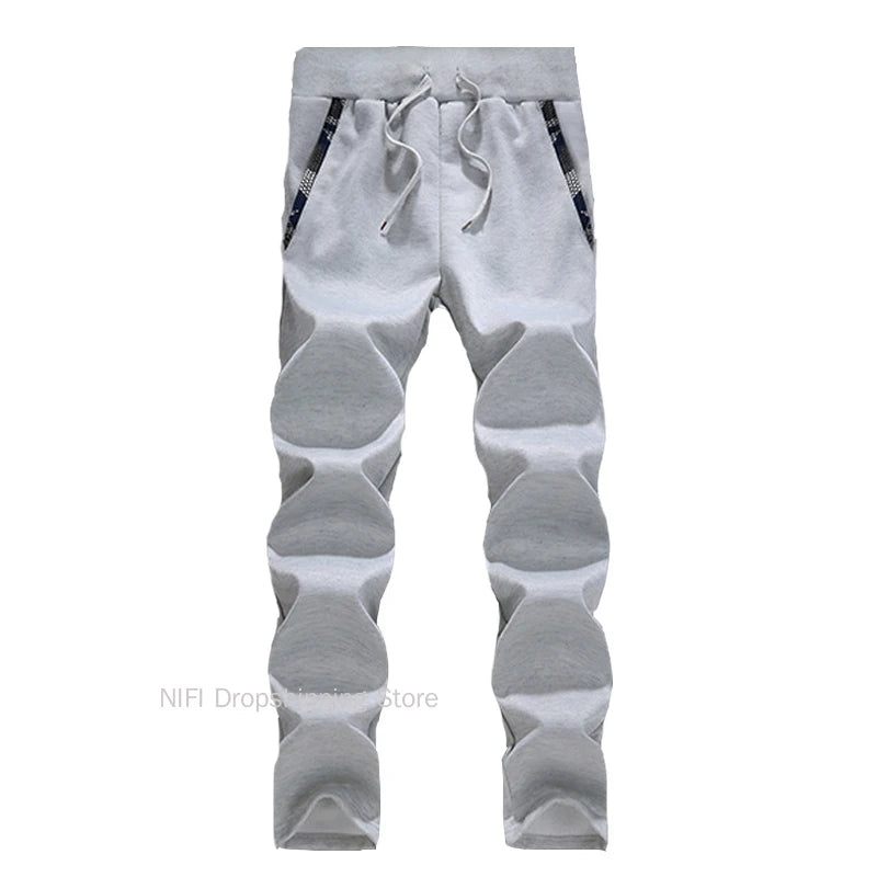 Gray and white patterned pants on a white background