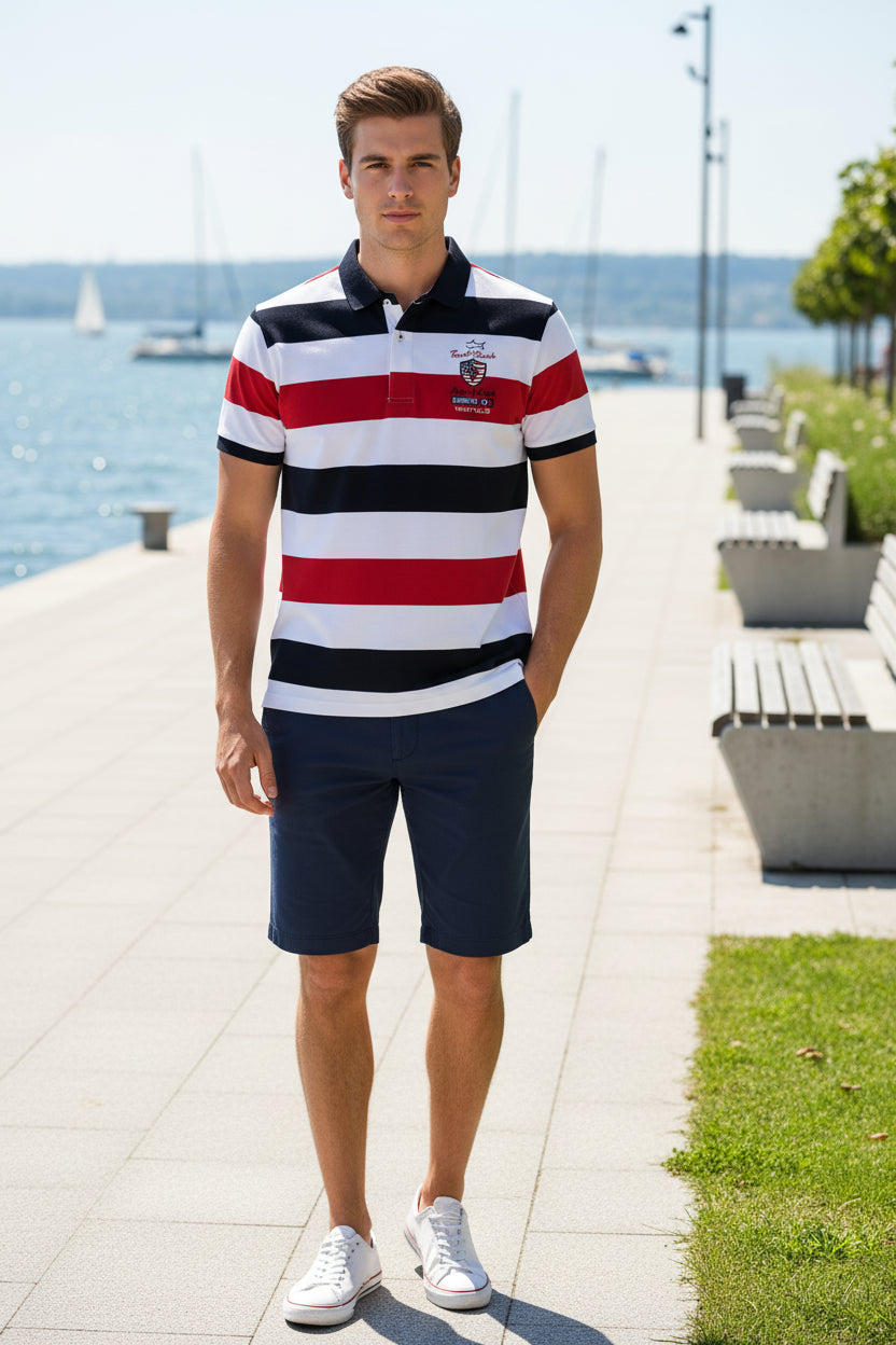 A men's short-sleeve polo shirt with horizontal stripes in white, black, and red. The shirt features a black collar, a two-button placket, and a chest patch with a shark logo and the text 'Tiger Shark'.
