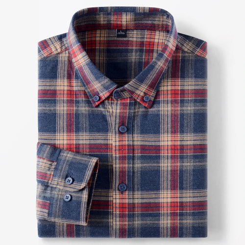 A folded long-sleeve plaid button-down shirt in navy blue, red, and beige, shown on a clean white background.