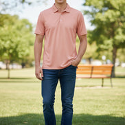 Pink polo shirt on a white background