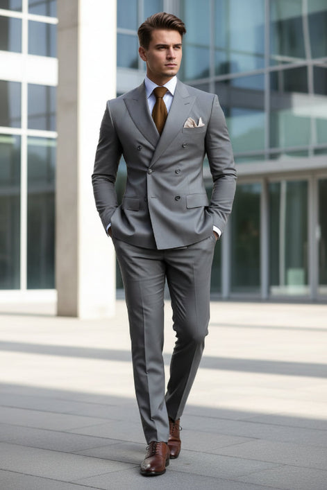 Gray suit with a brown tie and white shirt on a dark background