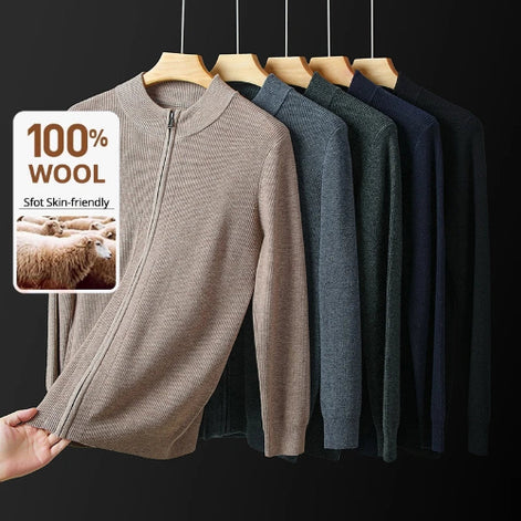 Row of wool sweaters on hangers with a hand holding one, featuring a '100% Wool' label.