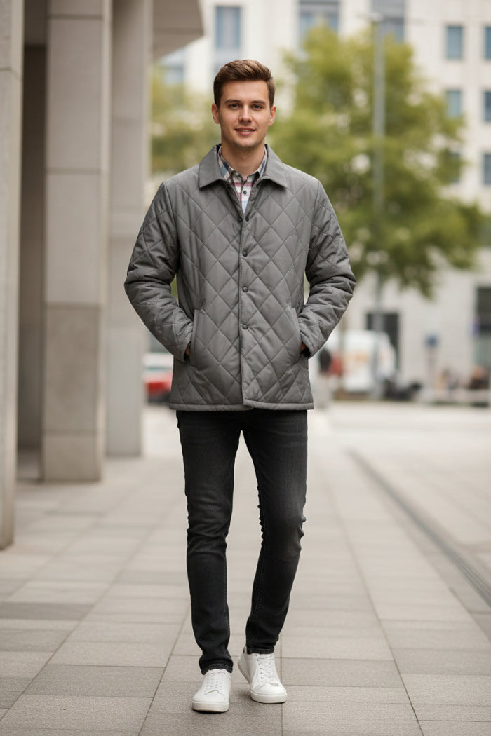Gray quilted men's jacket with an open plaid lining in white, blue, and red, shown on a white background with a feature callout graphic on the left.