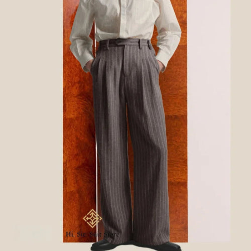 Gray pinstripe pants worn by a mannequin against a wooden panel background