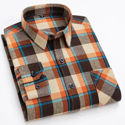 A folded long-sleeve plaid button-up shirt with a warm-toned pattern of orange, brown, beige, and blue, displayed on a clean white background.