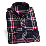A folded long-sleeve plaid button-up shirt with a navy, red, white, and green tartan pattern, displayed on a clean white background.