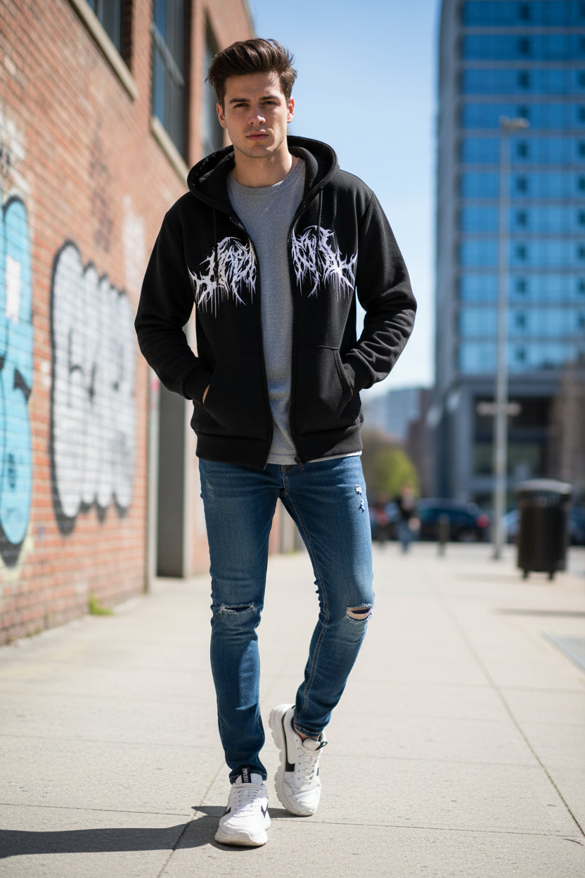 Black hoodie with white graphic design on a textured gray background