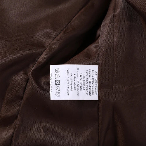 Close-up of the jacket's care label showing 100% polyester shell and lining, care symbols and made-in-China information⠋