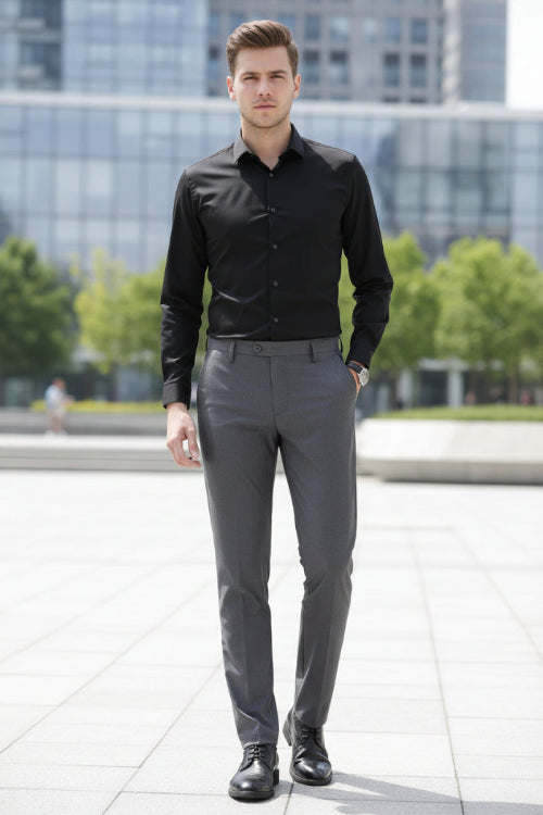 A man wearing slim-fit gray dress pants, a black shirt, and black dress shoes, shown from the waist down against a gray studio background. The brand name LANGBEEYAR is printed in the top left corner.