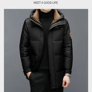 Black puffer jacket worn by a person on a gray background with text 'Finding the True Self, Meet a Good Life'.