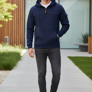 Navy blue hoodie with orange drawstring on a white background