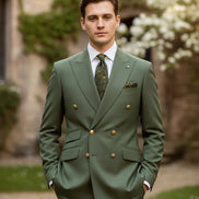 Green suit with jacket, pants, and tie on a white background