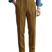 Golden brown herringbone pleated suit trousers shown on a white background