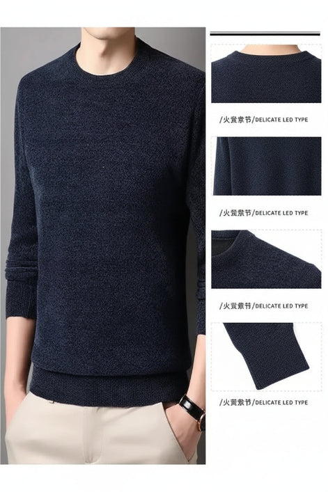 Dark blue sweater worn by a person with close-up details of the fabric.