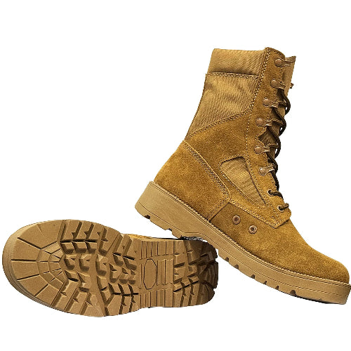 Pair of tan boots with a white background