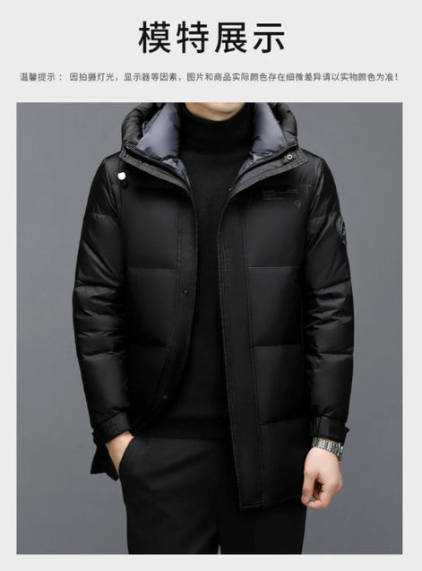 Black winter jacket worn by a person on a gray background