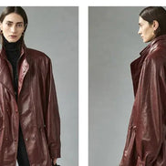 Front and side views of a woman wearing a reddish-brown faux leather jacket with layered collars and a gathered waist