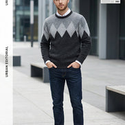 A men's long-sleeve knit sweater with a gray and black argyle pattern, layered over a white collared shirt, 