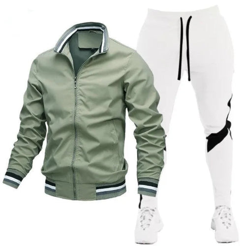 Green jacket and white pants with black accents on a white background