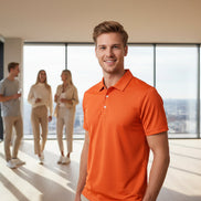 Orange polo shirt on a white background