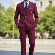 Magenta suit with gold buttons on a light gray background