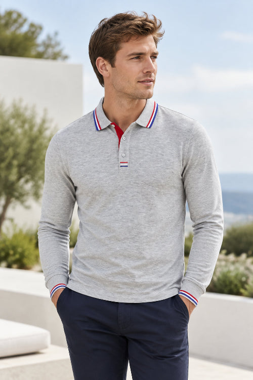 A light gray long-sleeve polo shirt with a red and blue striped collar and matching striped placket, shown on a white background 