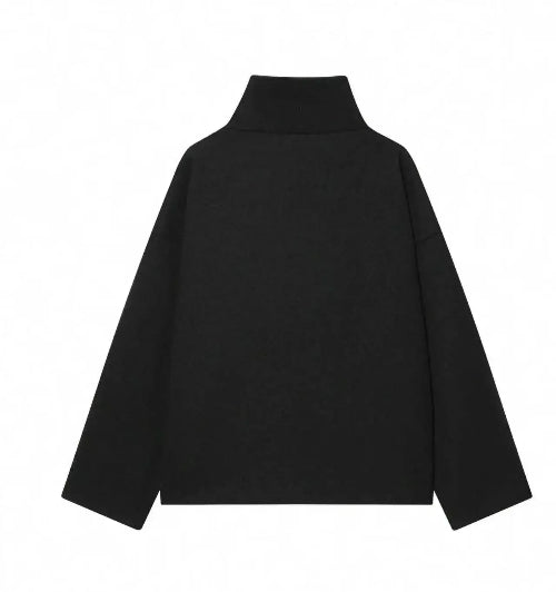Back view of a black short coat with a high collar and dropped shoulders