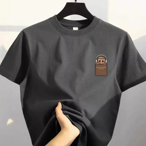 Black t-shirt with a small patch on a hanger