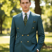 Gray suit jacket with gold buttons and matching pants on a white background