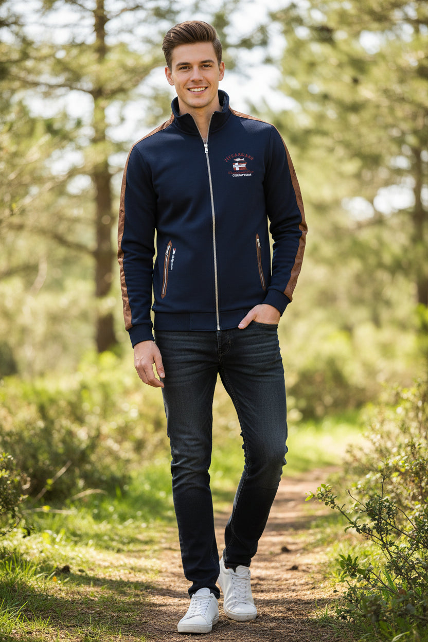 Navy blue jacket with brown accents on a white background