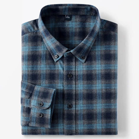 A folded long-sleeve plaid button-down shirt in blue and navy tones, shown on a clean white background.