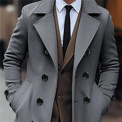 Gray overcoat worn by a person with a blurred background