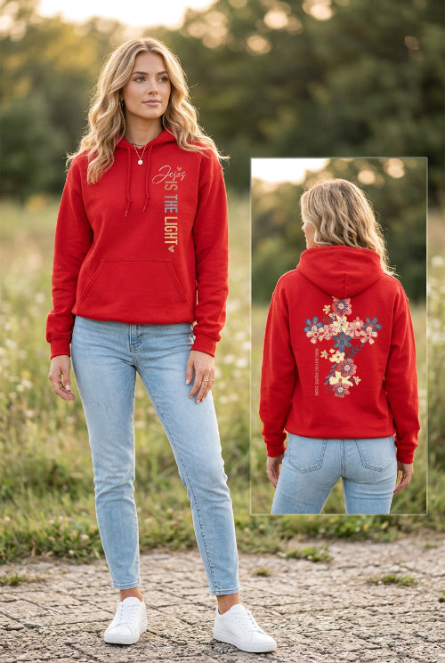 A red pullover hoodie shown on a model from both the front and back. The front features the text 'Jesus IS THE LIGHT' printed vertically in white and gold.