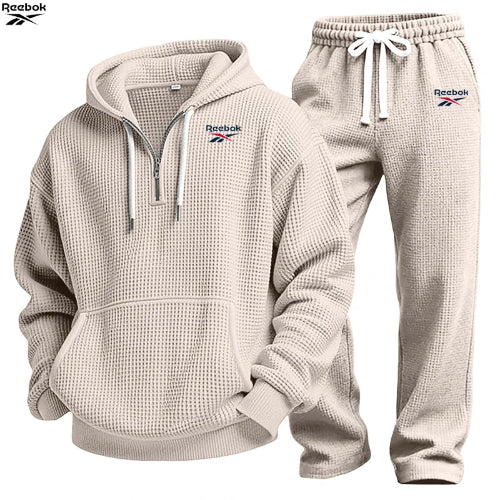 Beige waffle-textured hoodie and jogger pants set on a white background