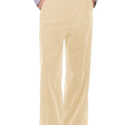 A person shown from the waist down wearing high-waisted, wide-leg corduroy trousers in a light beige color, paired with a lavender shirt and black shoes